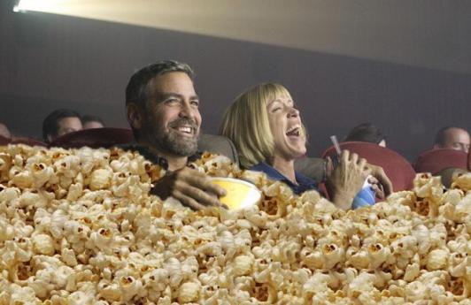 george-clooney-eating-popcorn-at-movies